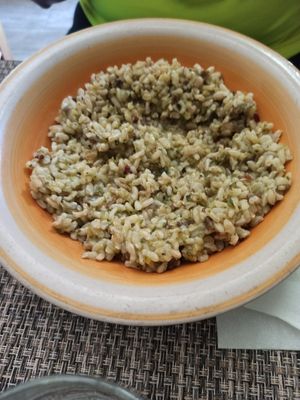 Risotto zucchine e olive: connubio perfetto. at Vibrazioni Vegetali in Abbiategrasso