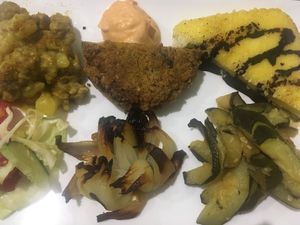 Soy stew, chickpea burger, grilled cheese with balsamico and mixed veggies at Vibrazioni Vegetali in Abbiategrasso