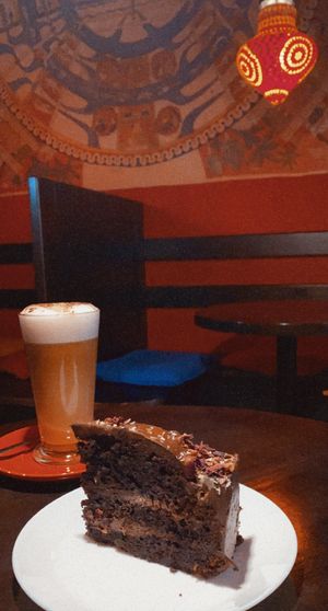 Vegan cake and latte  at Bonobo in Krakow