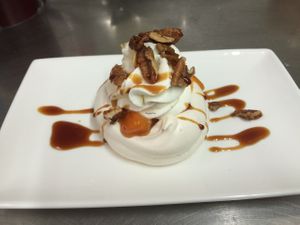 Apricot caramel pavlova. at Sa Pastanaga Restaurant in Mallorca