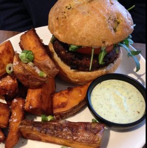 classic burger (vegan) with side of sweet potato fries at Mildreds - Camden in North West London