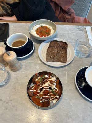 Patatas bravas on the bottom there. Whipped feta dish with gluten free bread up top.  at Mildreds - Camden in North West London