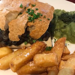 Mushroom pie, with chips and mushy peas  at Mildreds - Camden in North West London