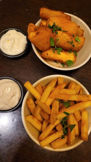 Fried Maniok and fries and truffle mayo at Space Burger in Dusseldorf
