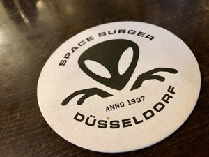 beer mat at Space Burger in Dusseldorf