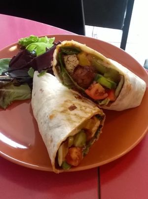 BBQ tofu wrap with salad dressing at True Coffeehouse in Newcastle Upon Tyne