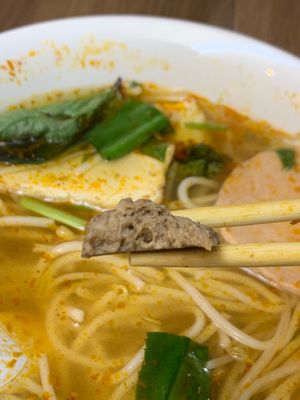 Vegan beef. It’s sooooo flavorful. Texture is glueny but still tasty. at Dharma Garden Veggie Deli in Vancouver