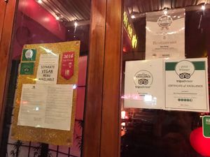 Front window  and V Poster  at Bay Hong in Darlinghurst