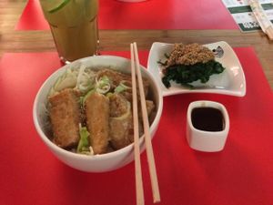 Tofu Tonkatsu with spinach and matcha iced tea. at Bento Box - City Center in Cologne