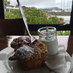 rhubarb muffin and coconut cream  at Bach on Breakwater in New Plymouth