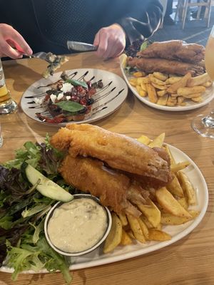 Vegan fish and chips and vegan bruschetta with vegan feta  at Waves on the Beach in Frankston