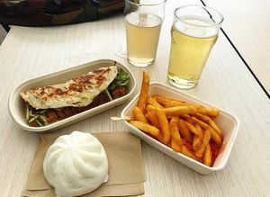 Duck pancake, BBQ pork bao and fries with sweet chilli sauce at Woking Amazing in Northcote