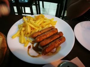 Mildly spicy vegan hotdogs with french fries  at Ayana in Petach Tikva