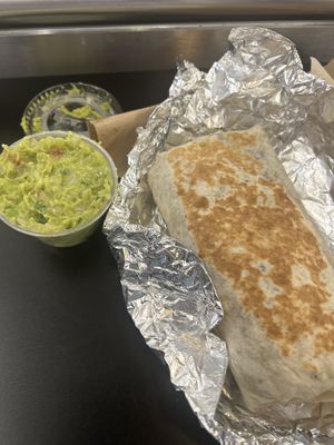 Very veggie burrito and super sharp/oniony Guac  at ORD - Burrito Beach & B Smooth - T3 in Chicago