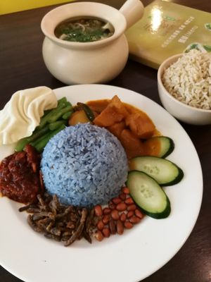 Nasi Lemak. Note the curry is not vegan as they mock meat has eggs in them. They gave us potatoes instead but after I finished my meal I found out they didn't cook the potatoes separately. I guess my chat with them got lost in translation... Perhaps I can ask for more vegetables next time or ask to cook one separately  at Love Earth Cafe in Kepong