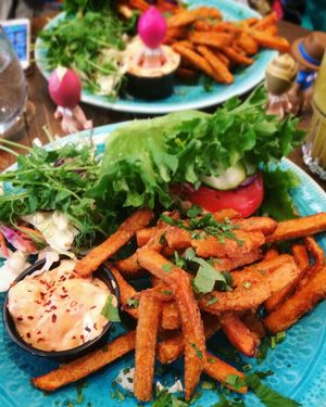 Burger plate; soy burger, salad, sweet potato fries, chili mayo. (Sonny angels not included!) at Mahalo - Hornsgatan in Stockholm