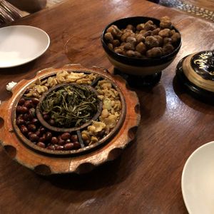 After our email meal - freebies. Tea leaf salad, nuts and dried beans. Sticky rice popcorn. at Mingalabar Myanmar Restaurant in Mandalay