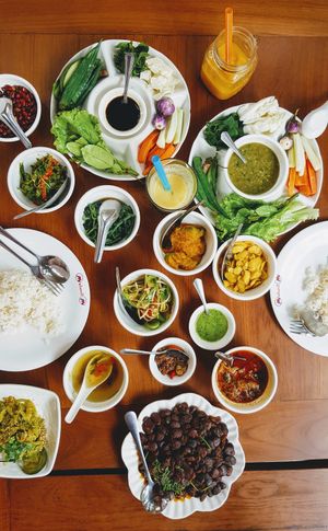 1 curry, 1 salad, 2 juices and free sides at Mingalabar Myanmar Restaurant in Mandalay