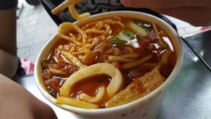 NT100 Tomatoes soup with Japanese Noodles. Plenty of ingredients. Slightly spicy & a bit oily. Noodles r smooth & chewy. at Xiang Guang  in Taipei