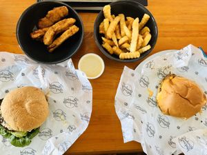 Burgers, fries, cheese sauce and wings at Soul Burger in Randwick