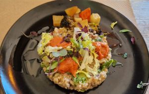 Timbal de xatonada amb mongeta blanca, arròs integral, escarola i romesco, i verdures rostides at Kombu in Sant Cugat Del Valles