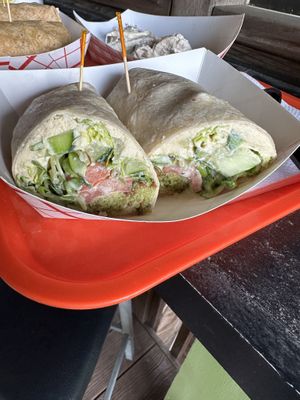 Falafel wrap with regular wrap, lemon tahini instead of tzatziki and added hummus   at Tiger Lily Cafe in Port Jefferson