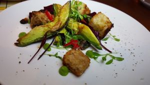 Pan seared avocado at Miss Kaplan in Tel Aviv
