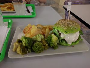 Burger from the specials menu - black beans and tomato with macha bun at Vegana Burgers - Atrium Saldanha in Lisbon