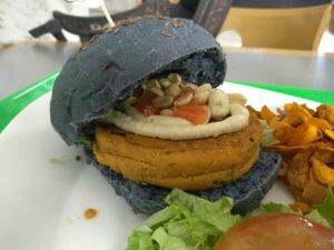 Peanut and chickpea burger in red onion bread at Vegana Burgers - Atrium Saldanha in Lisbon