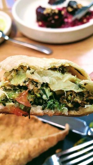 Broccoli & coconut cheese empanada at The Independent in Gembrook