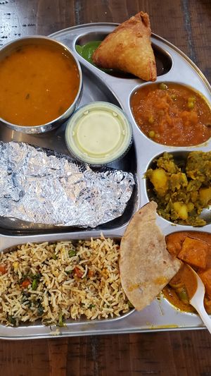 Full Thali with 3 curries at Sattvik Foods in San Diego
