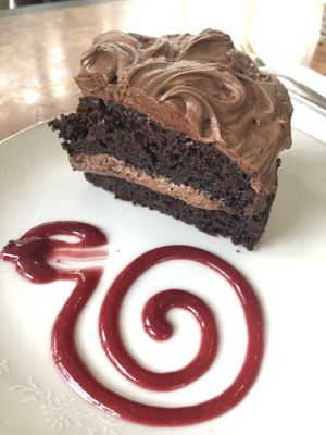 Chocolate zucchini cake with raspberry coulis  at Kallista Tea Rooms in Kallista