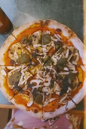 Vegan pizza. Sorry about the filter on the photo! at By Hand Cafe in Chiang Mai