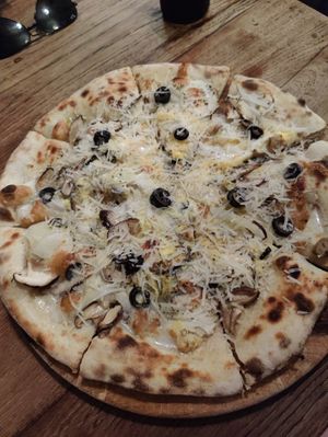 White pizza deluxe with olives (vegetarian!) at By Hand Cafe in Chiang Mai