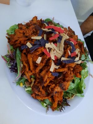 Buffalo soy curl salad, crazy good, there's vegan ranch, corn & avocado & lots of greens under there at Homegrown Smoker in Portland