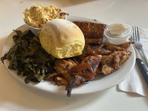 Combo plate - tempeh, Chick’n, greens, coleslaw and bread roll  at Homegrown Smoker in Portland