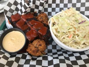 Ribs with coleslaw and hush puppies - tadow! at Homegrown Smoker in Portland