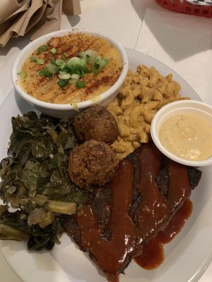 Seitan ribs, gritz, collards, mac, hush puppies  at Homegrown Smoker in Portland