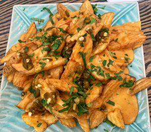 Crispers with cheese sauce & jalepeno's at Blackbird in Gothenburg