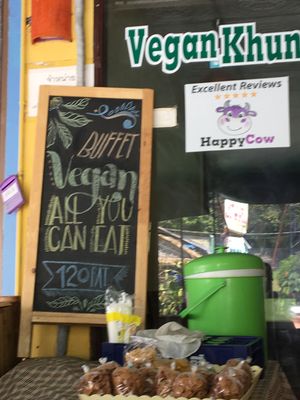 awful picture, but here’s the sign for the all you can eat 120 baht vegan buffet!  at Vegan Khunnay in Koh Samui