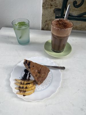 Pear cake and drinks  at Alcachofra Cafe in Faro