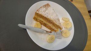 Coconut carrot cake yummmiiii at Alcachofra Cafe in Faro