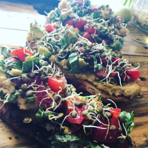 Charred sourdough with hommus and sprouts at The Organic Sustainable Food Trailer in Torquay