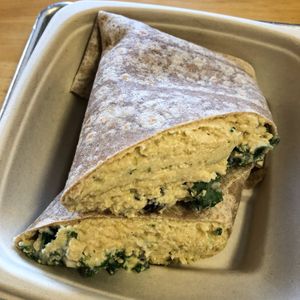 "Big Kahuna" - chick pea tuna salad wrap with dried cranberries and kale.  Filling! at Plant Wise in Dix Hills