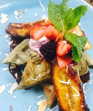Vegan Buckwheat and Matcha Waffles with Cashew Cream and mixed berries at Wild Thyme Cafe in Bright