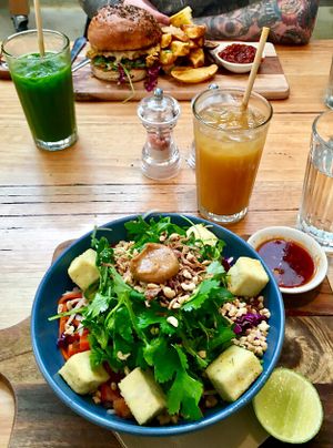 Vegan pad Thai and vegan KFV burger with cold pressed juices. at Wild Thyme Cafe in Bright