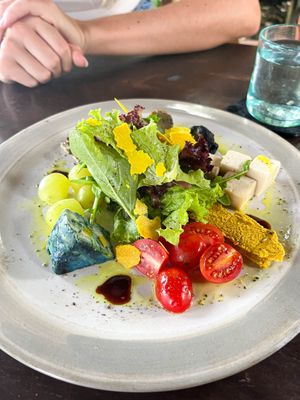 Cheese Platter - served with living crackers, grapes, baby tomatoes, and organic greens. at Moksa in Ubud