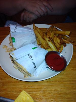 Tuna wrap with house made fries. at Veggie Grill in Woodland Hills