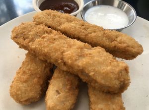Battered crusted Chill Out ChickUn Wings w/ vegan ranch + bbq. Delicious at Veggie Grill in Woodland Hills