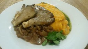Roasted oystermushrooms with potato-carrot purée at Pastva in Prague